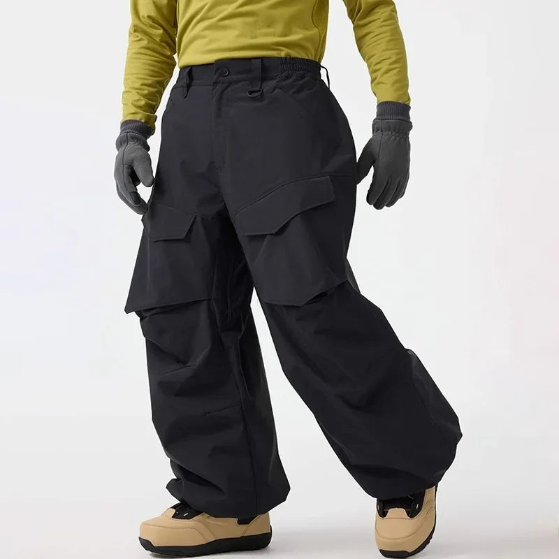 Men Baggy Wear-resistant Skiing Pants Women Insulated Loose Pockets Winter Trousers Outdoor Sports Waterproof Clothes 2025 Warm