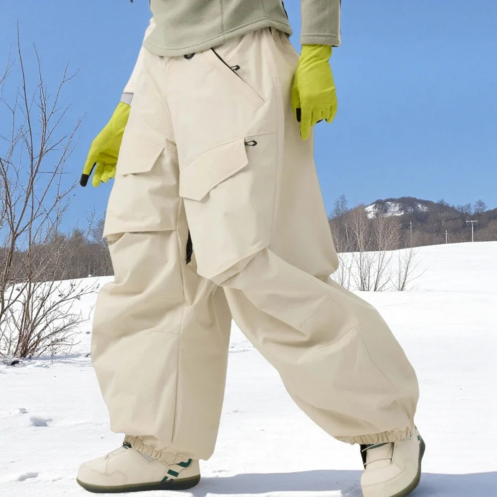 Men Baggy Wear-resistant Skiing Pants Women Insulated Loose Pockets Winter Trousers Outdoor Sports Waterproof Clothes 2025 Warm