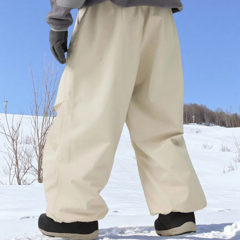 Men Baggy Wear-resistant Skiing Pants Women Insulated Loose Pockets Winter Trousers Outdoor Sports Waterproof Clothes 2025 Warm