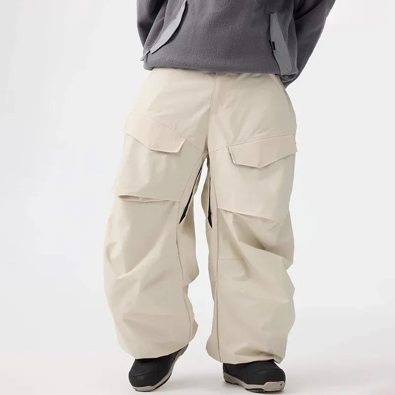 Men Baggy Wear-resistant Skiing Pants Women Insulated Loose Pockets Winter Trousers Outdoor Sports Waterproof Clothes 2025 Warm